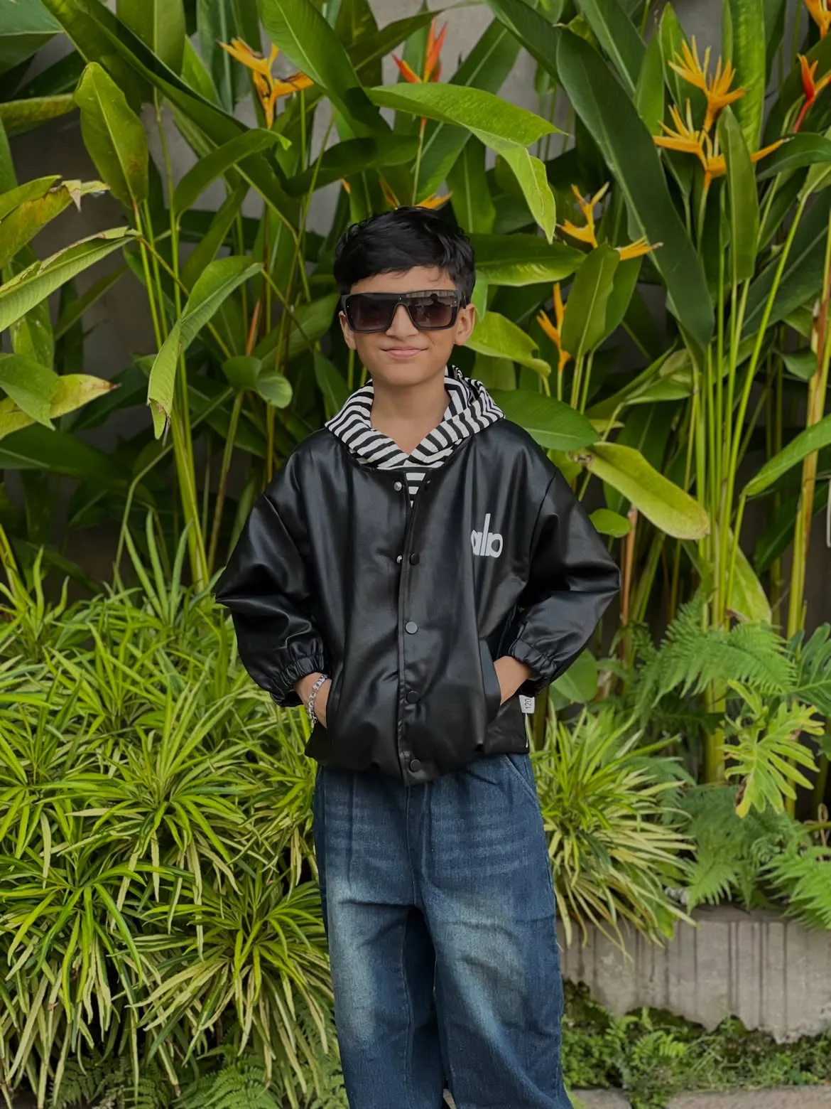 Cool boy posing in Kidsmire streetwear set