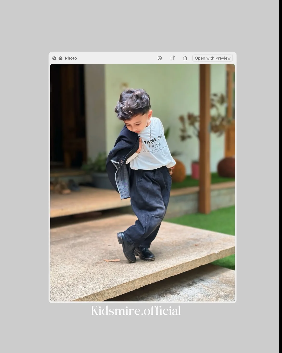 Toddler boy in chic Kidsmire black outfit