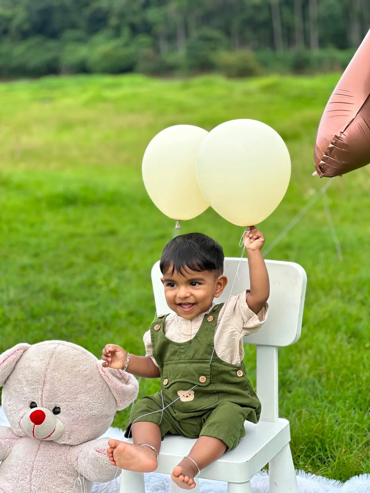 Cute baby girl sitting comfortably in Kidsmire set